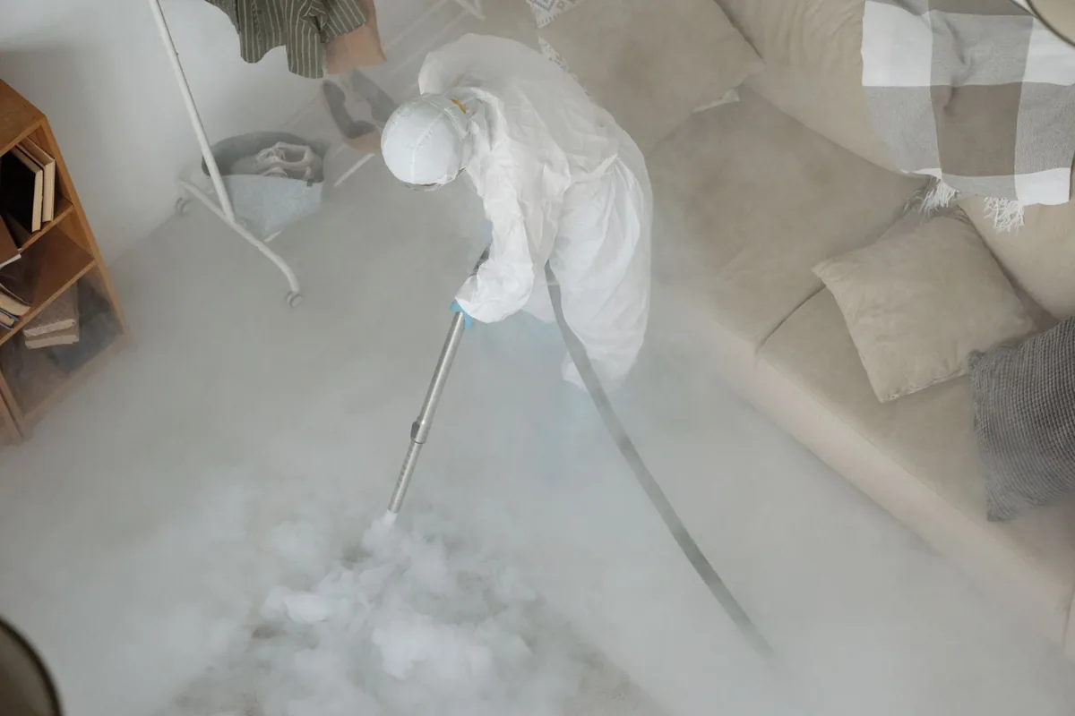 Biohazard cleanup technician in protective equipment, Battle Mountain, NV